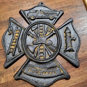 Fireman cast iron wall hanging